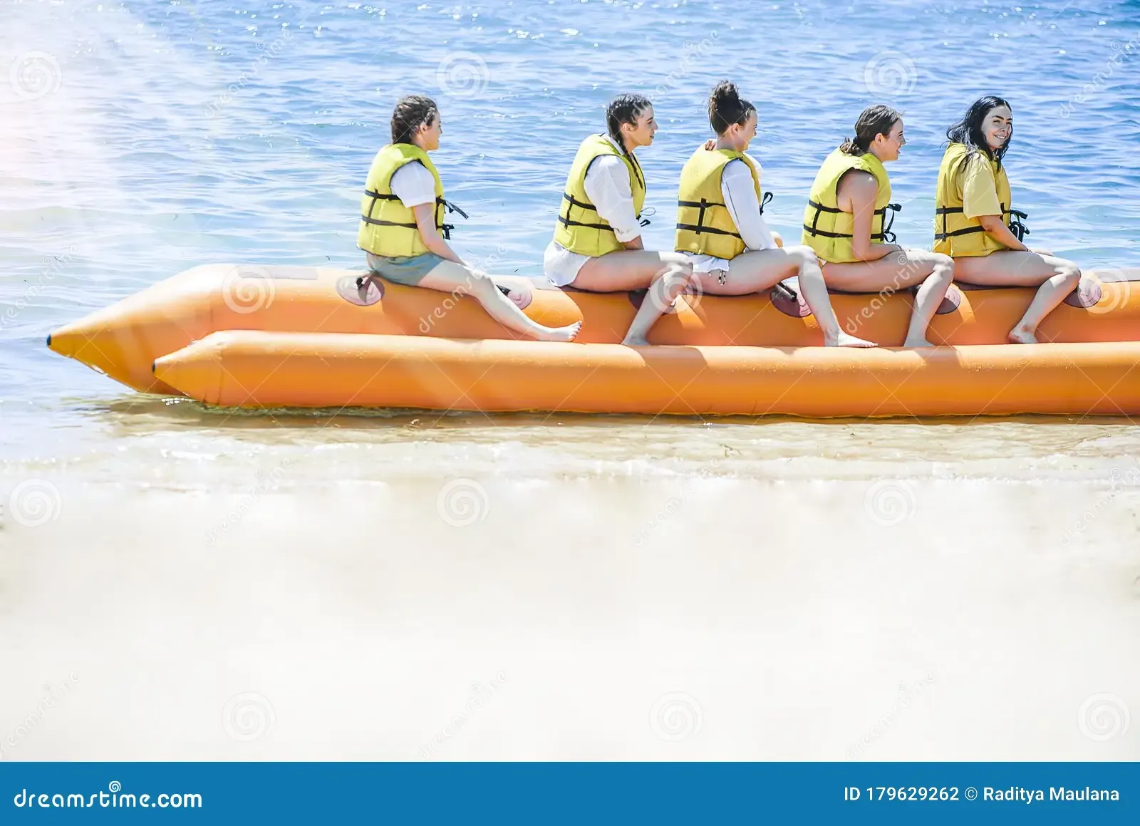 group-people-ride-banana-boat-sunlight-morning-tanjung-benoa-bali-banana-boat-summer-beach-179629262