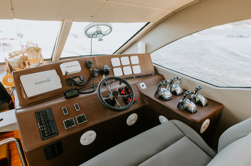 boat charter Bali to Nusa Penida luxury yacht interior