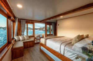 Book Private Trip by Ayvara Deluxe Phinisi 2026 1 Book Private Trip by Ayvara Deluxe Phinisi 2026 Master Balcony View