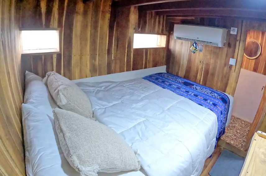 Book Private Trip by Malca Luxury Phinisi 2026 Master Cabin