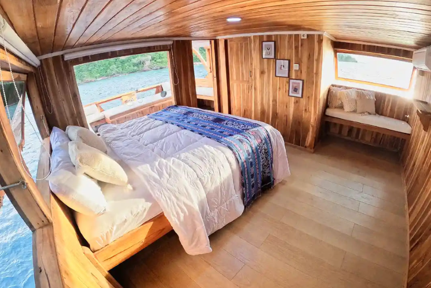 Book Private Trip by Malca Luxury Phinisi 2026 Master Cabin