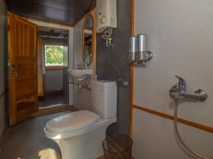 Book Private Trip by Revfiero Luxury Phinisi 2026 - Master Cabin Balcony