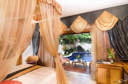 Bungalow over Koi pond view when you Book The Water Garden Hotel Candidasa 7 Book The Water Garden Hotel Candidasa 2026