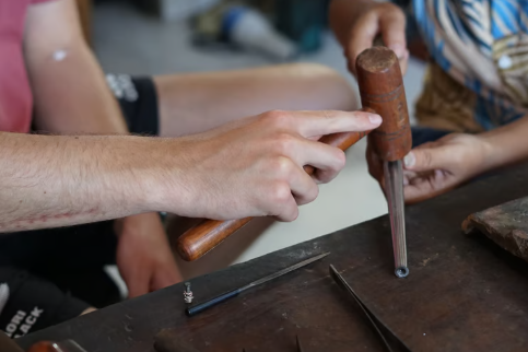 Handcrafting jewelry at our Book Silver Class in Canggu