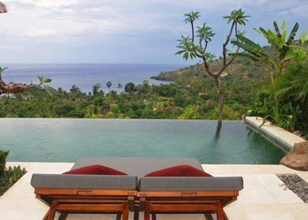 Infinity pool view when you Book The Griya Villas and Spa Amed 4