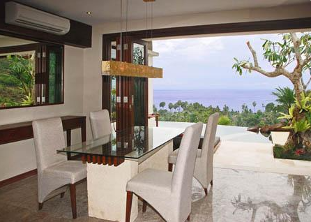 Infinity pool view when you Book The Griya Villas and Spa Amed 9