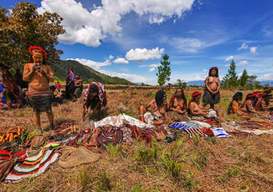 People trekking to book 15 day Kombai Korowai expedition