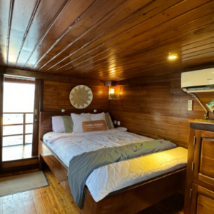 Radea Phinisi luxury charter booking - Master Cabin Balcony