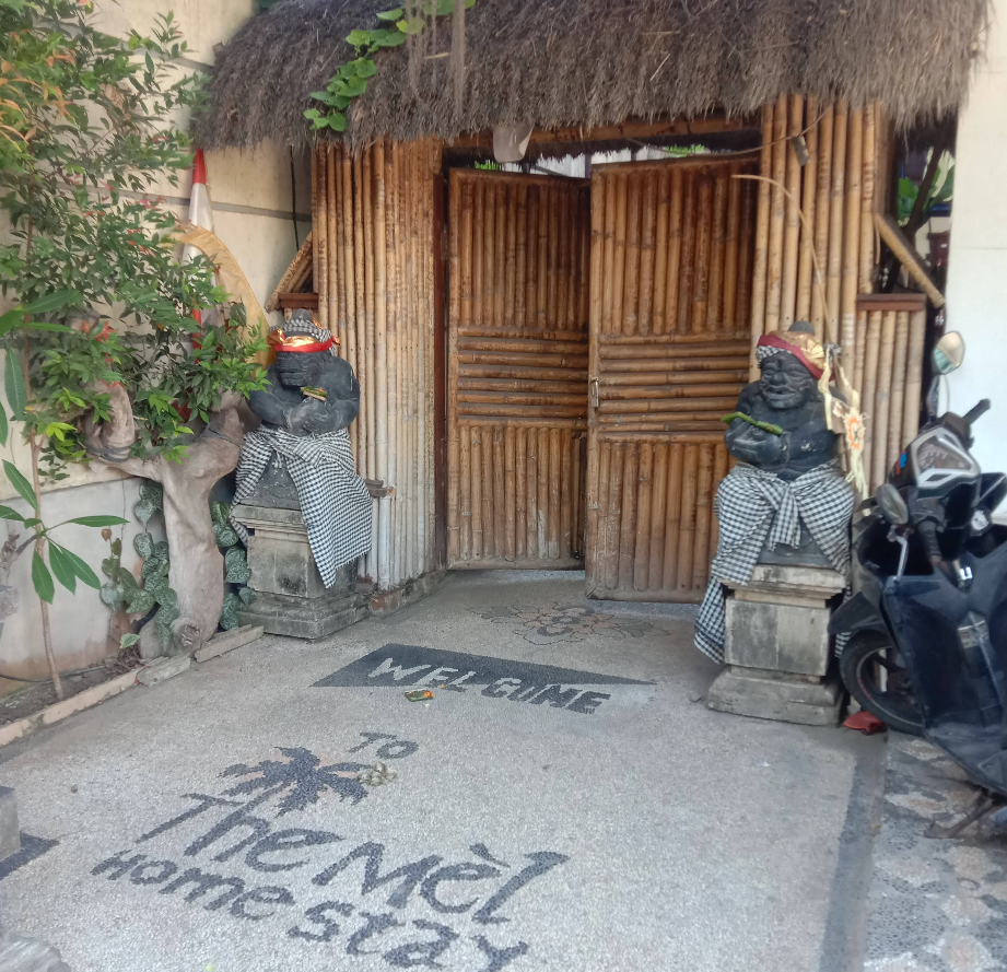 The Mel Homestay entrance and lush garden 7