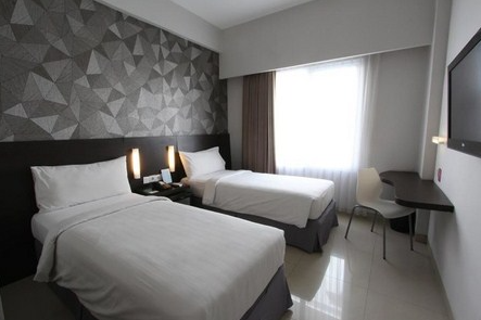 uxury Suite with Bathtub when you Book Crystal Kuta Hotel 3